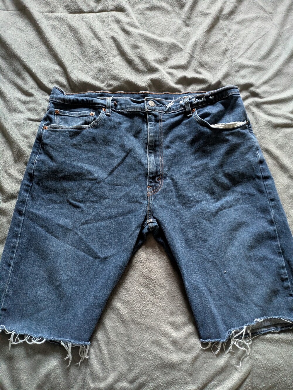 Distressed Levi's Dark Blue Cut-Off Denim Shorts